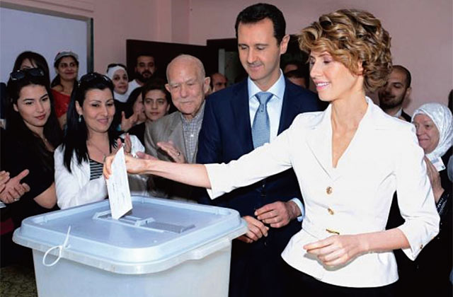 아사드 대통령과 부인 아스마가 2014년 대선에서 투표하고 있다. ⓒphoto SANA통신