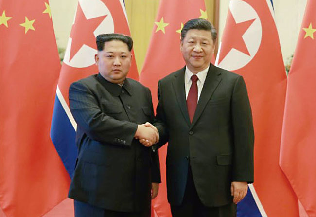 지난 3월 28일 북·중 정상회담을 가진 김정은 위원장(왼쪽)과 시진핑 주석. ⓒphoto 뉴시스