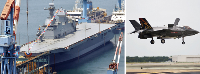지난해 5월 진수식을 가진 대형상륙함 2번함 마라도함과 미국의 최신예 F-35B 스텔스 전투기(오른쪽 사진). ⓒphoto 뉴시스