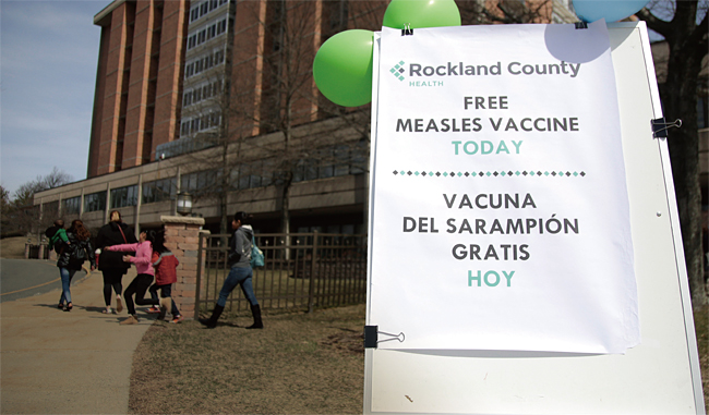 최근 미국 뉴욕주 포모나의 로클랜드카운티 보건소에 세워진 홍역 백신 무료접종 안내판. ⓒphoto 뉴시스