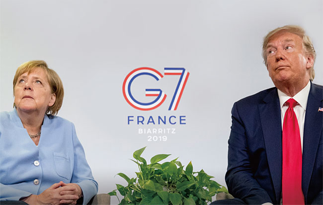 지난해 4월 프랑스에서 열린 G7 정상회의에 참석한 트럼프 대통령과 메르켈 총리(왼쪽). ⓒphoto 뉴시스