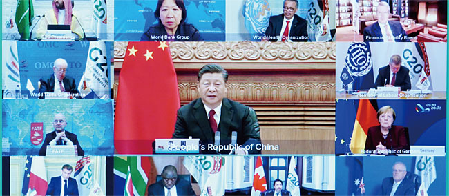 지난해 11월 열린 G20 화상 정상회의에서 시진핑 중국 국가주석(가운데)이 토론하고 있다. ⓒphoto 뉴시스