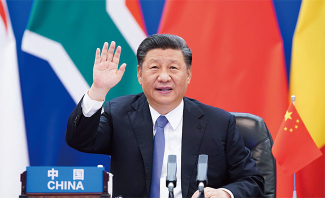 2020년 6월 베이징에서 열린 중국·아프리카 정상회의에서 시진핑 주석이 거수하고 있다. ⓒphoto 뉴시스