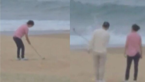 29일 YTN 보도에 따르면 지난 27일 오후 강원 삼척 해변에서 골프 연습을 하는 한 남녀의 모습이 포착됐다. photo YTN 보도화면